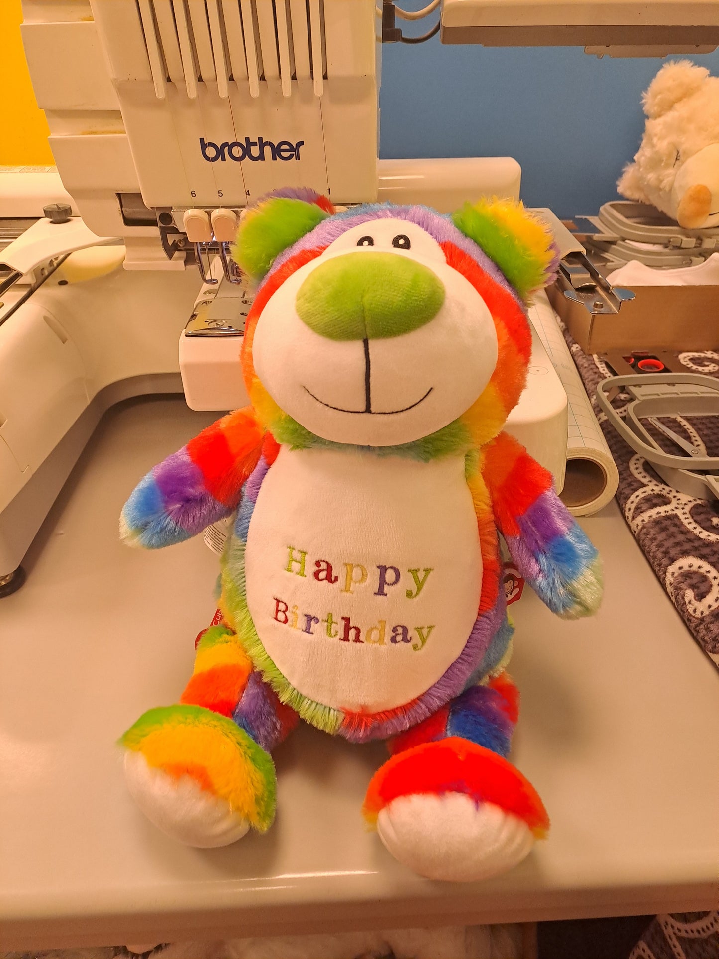 Happy Birthday bear with balloons.